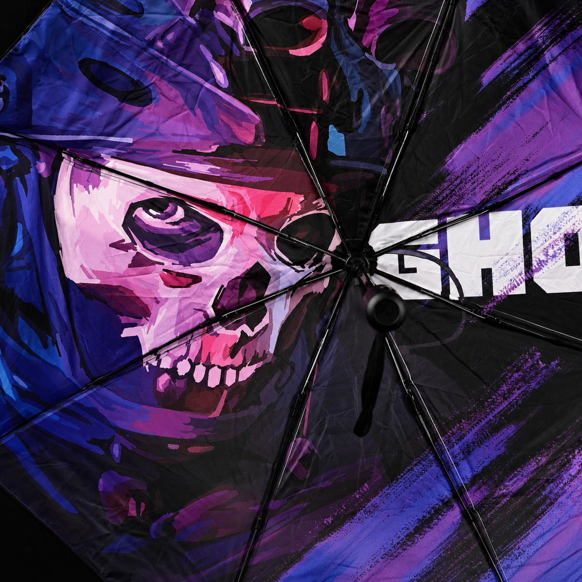 Close-up of the umbrella interior showing purple and blue skull-masked character artwork