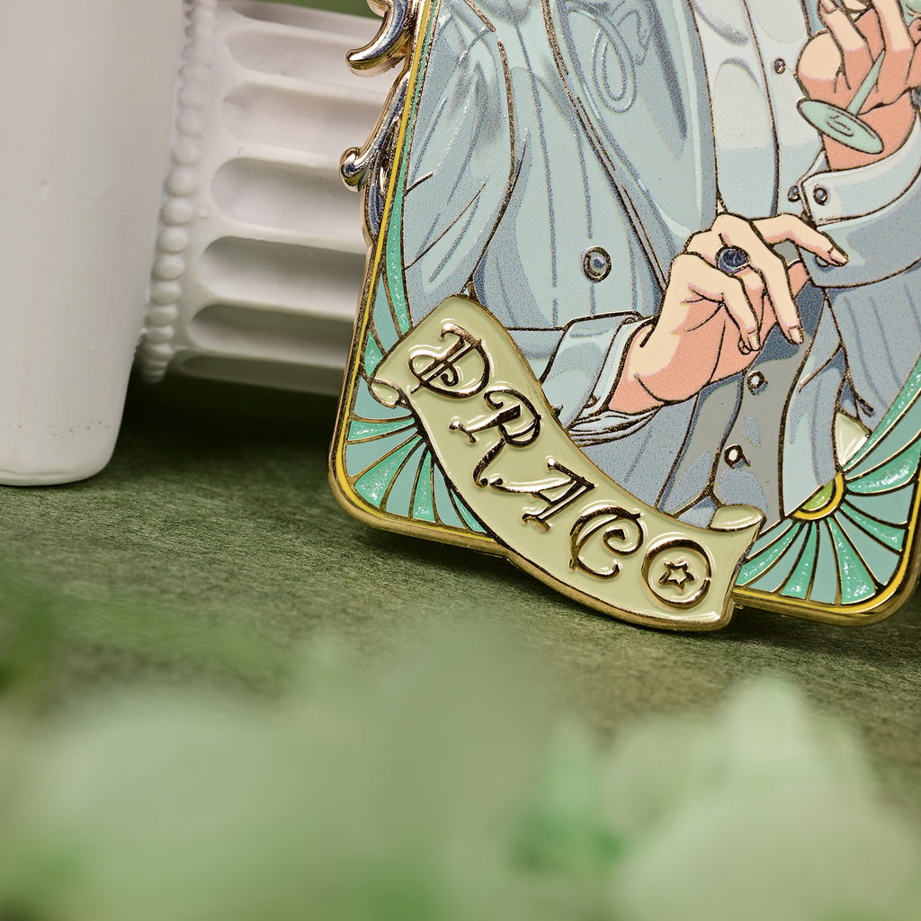 Close-up of the lower front of the Jazz Age 1920 Darco enamel pin showing the suit, hands, and PRACO banner