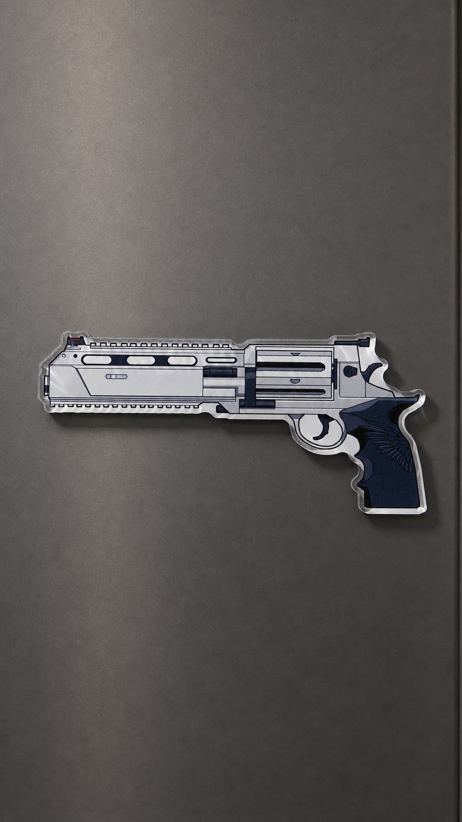 Requiem revolver-inspired metal fridge magnet with a detailed silver and black firearm design